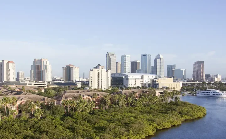 The Sunbelt remains a magnet for domestic movers, driven by affordability, tax advantages, and lifestyle factors. | Pictured: Tampa, FL