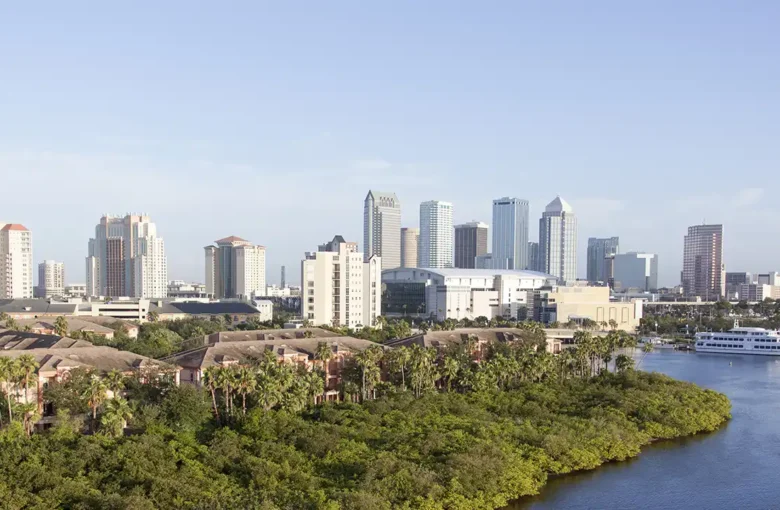 The Sunbelt remains a magnet for domestic movers, driven by affordability, tax advantages, and lifestyle factors. | Pictured: Tampa, FL