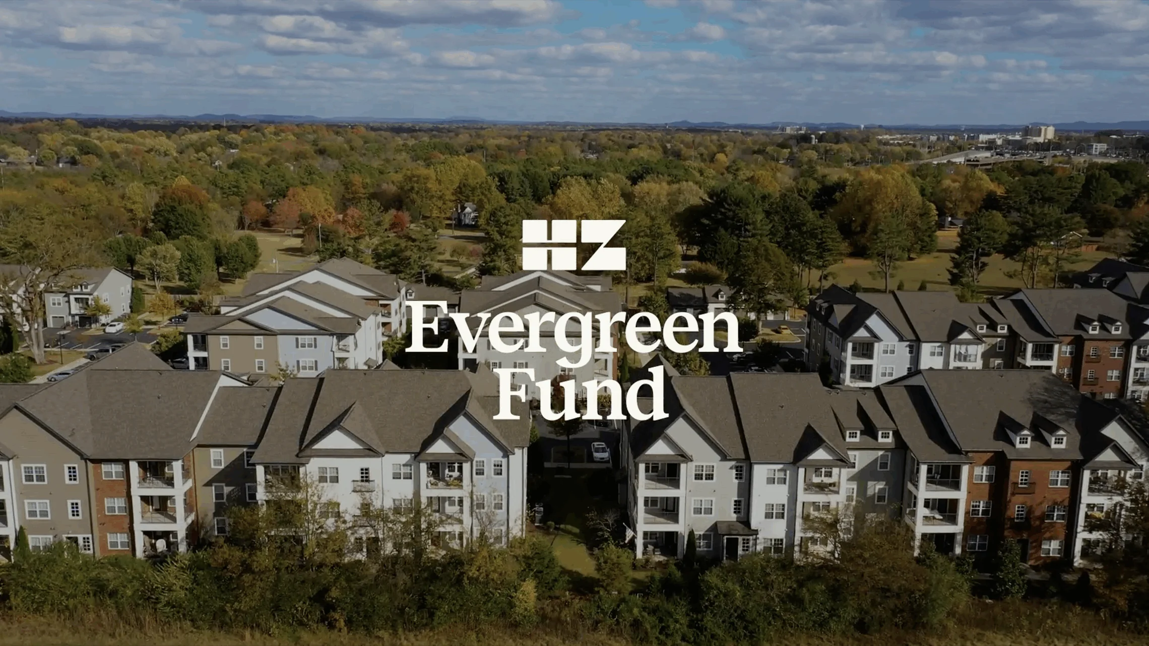 overhead photo of multifamily community with hz evergreen fund logo overlay